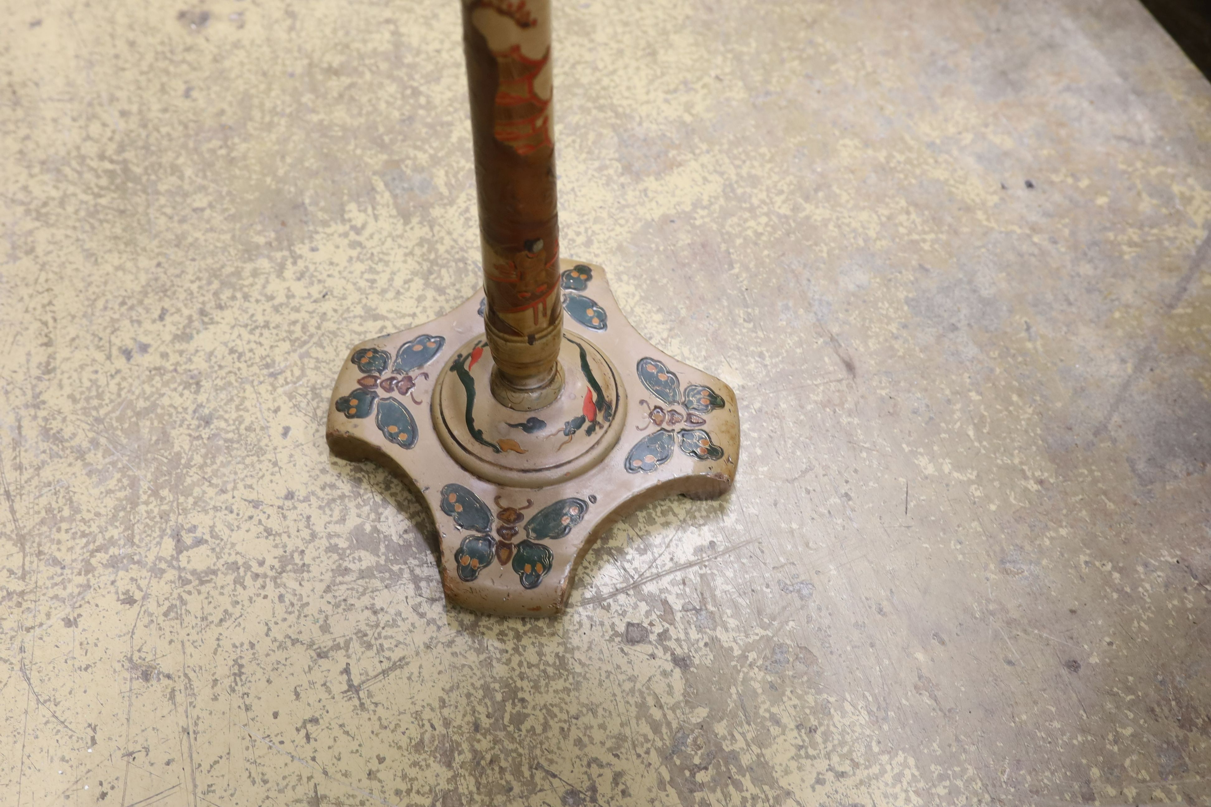 A Chinese lacquer circular wine table, diameter 36cm, height 67cm